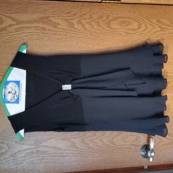 Onyx Nite Tops - Sleeveless Formal Top Size 8 with ruffled bottom